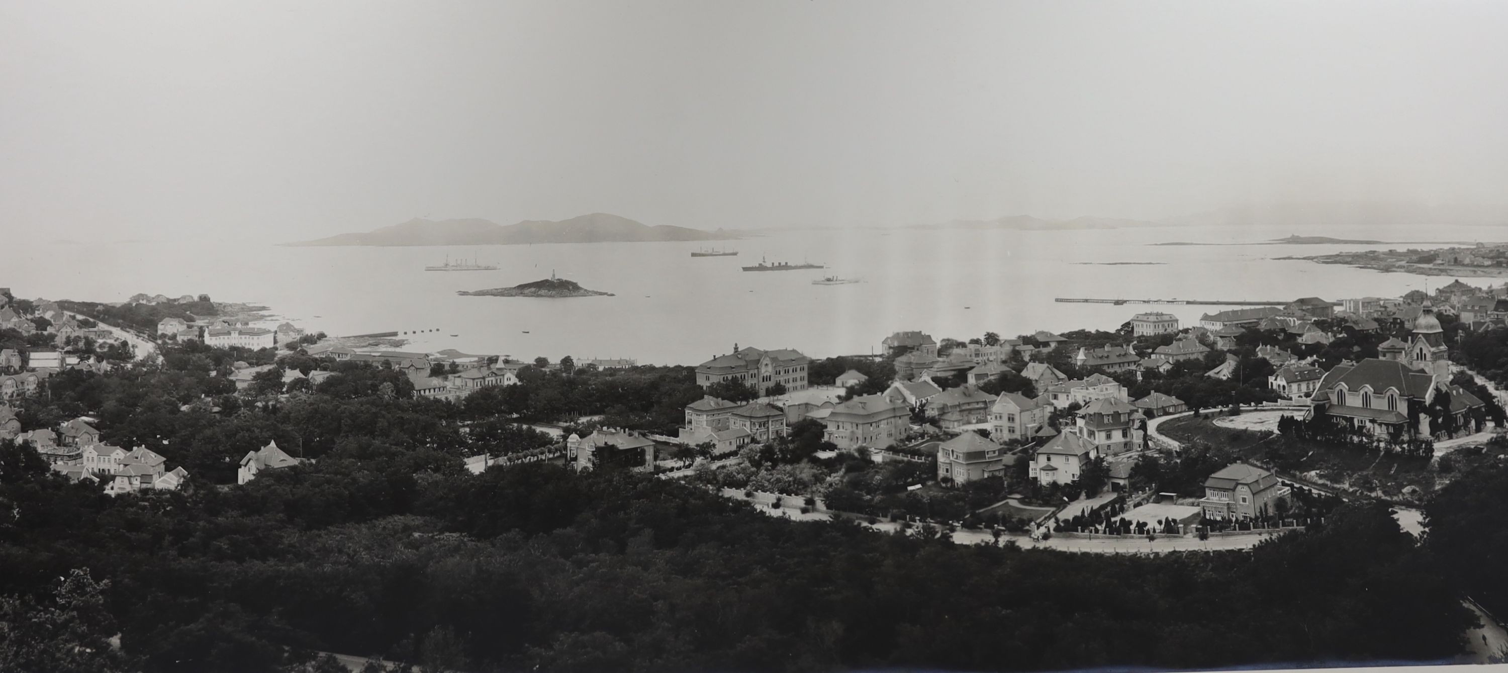 An early 20th century Chinese panoramic photograph of Qingdao Paper 149 x 25cm